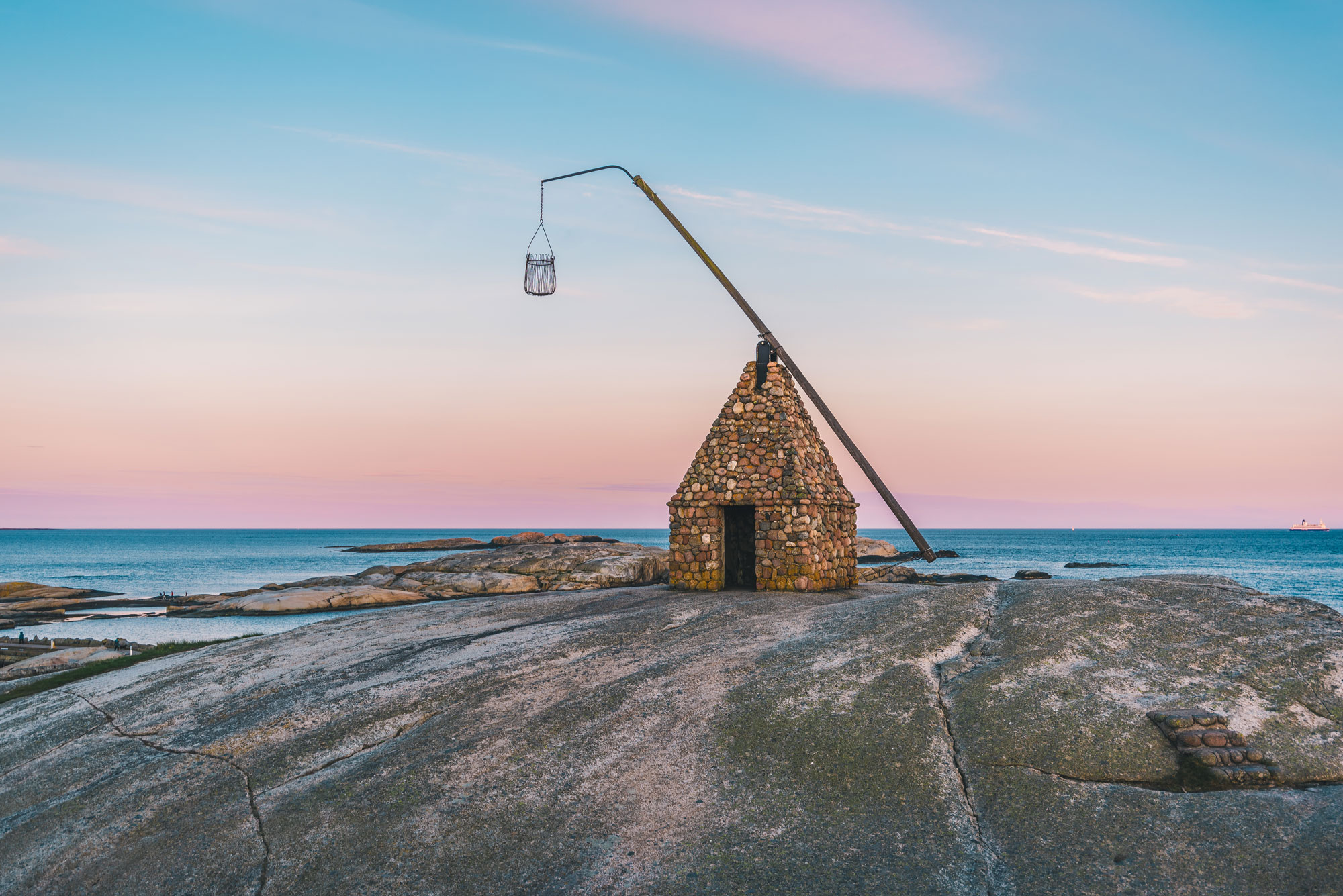 Vippefyret på Verdens ende på Tjøme i solnedgang med hav i bakgrunn