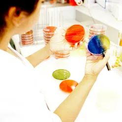 A person holding a test tube