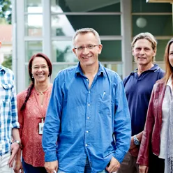 A group of people posing for a photo