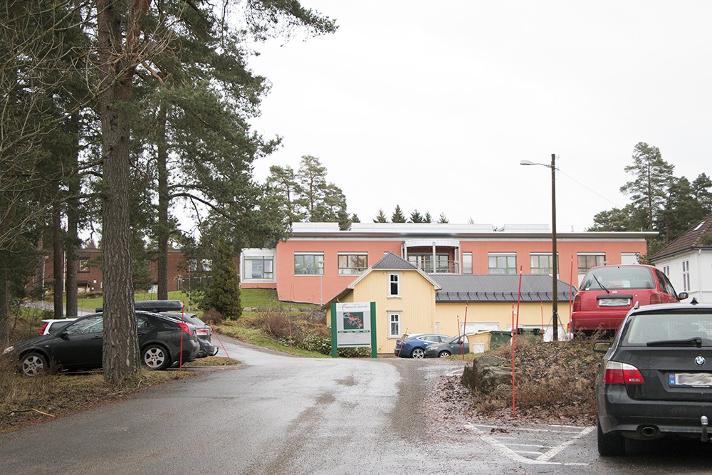A building with cars parked in front