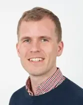 A boy smiling for the camera