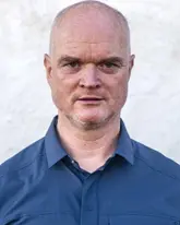 A man with a blue shirt