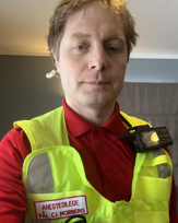 A man wearing a vest