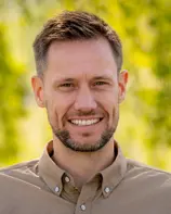 A man smiling for the camera