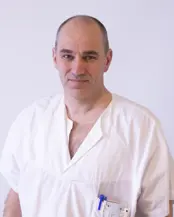 A man wearing a white shirt